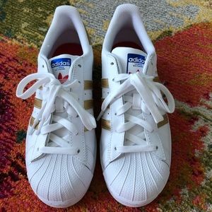 Gold stripe Adidas Superstar!